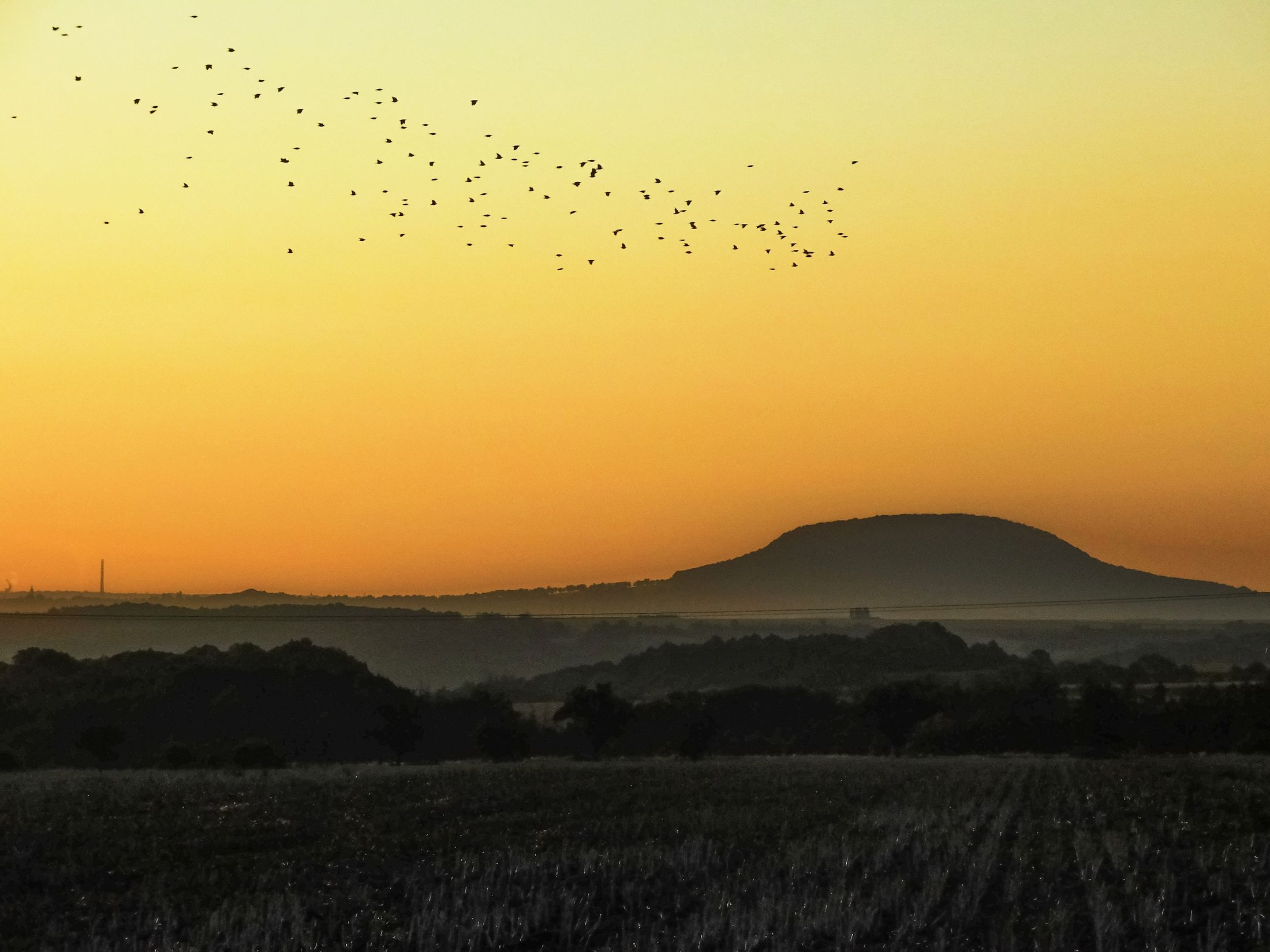 Hora Říp při západu slunce